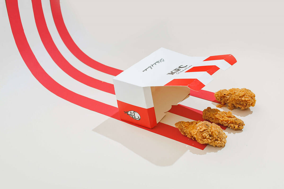 A KFC box with 3 pieces of 3-D created chicken nuggets, part of the Toast food trend forecasts for 2021