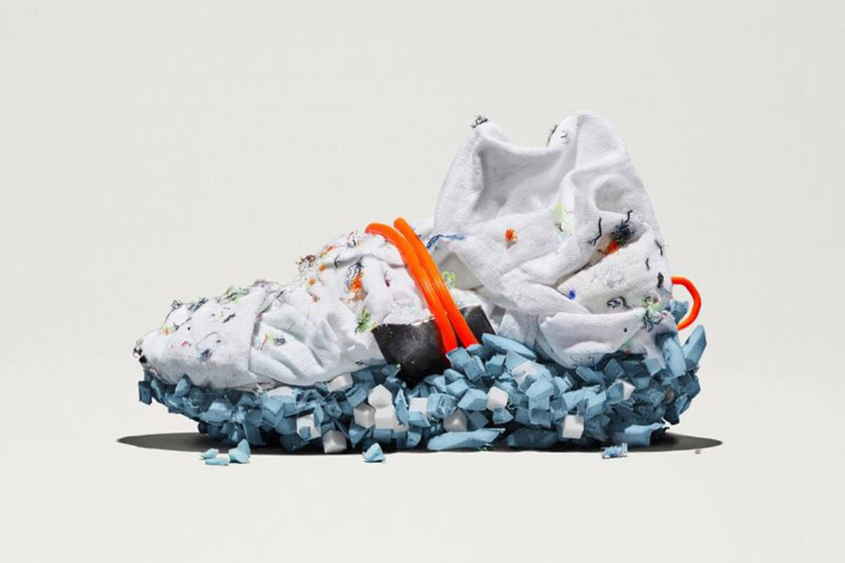 Nike Space Hippy Recycled Sneaker is a Toast forecasted 2021 trend, and  has a futuristic look with white top, blue heel and orange ties.