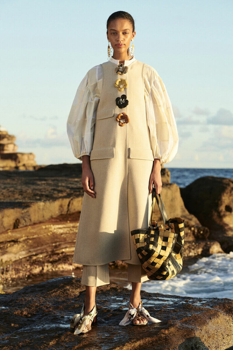 A model in an off-white outfit by Tory Burch, Pre-Fall 2021 Fashion Collections