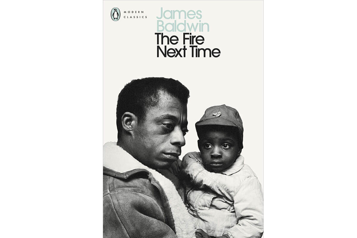 Black man and young boy on a book cover for The Fire Next Time by James Baldwin, essential non-fiction for Black History Month 