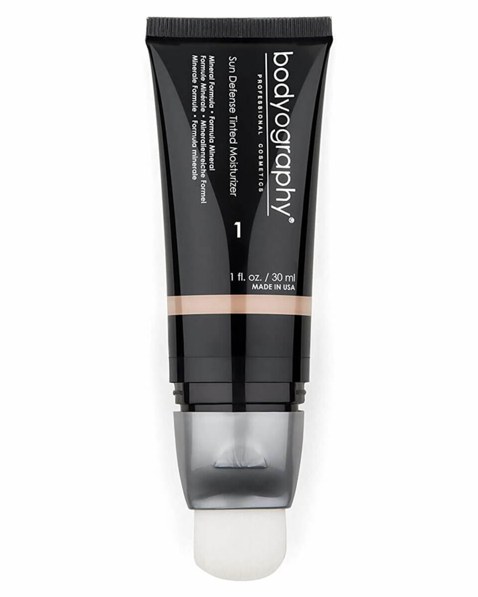 Black, grey and beige tube of 
Bodyography’s Sun Defense Tinted Moisturizer - one of Holly Decker's favourite skin hydrating products