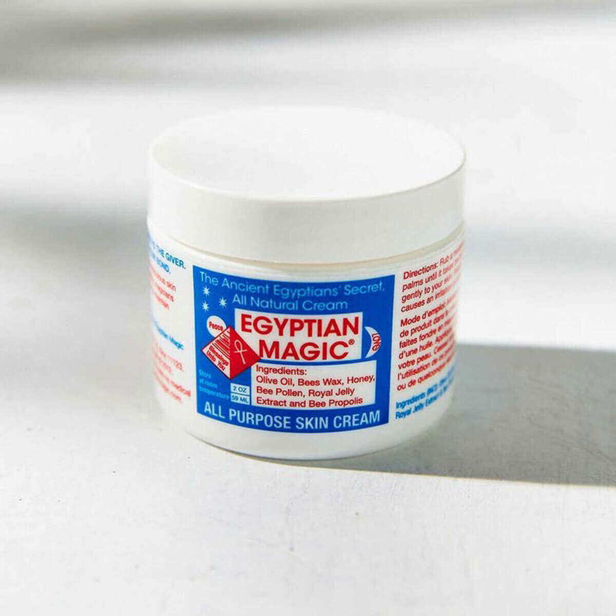 Round blue, white & red container of  Egyptian Magic All Natural Cream, one of Holly Decker's favourite hydrating skin products

