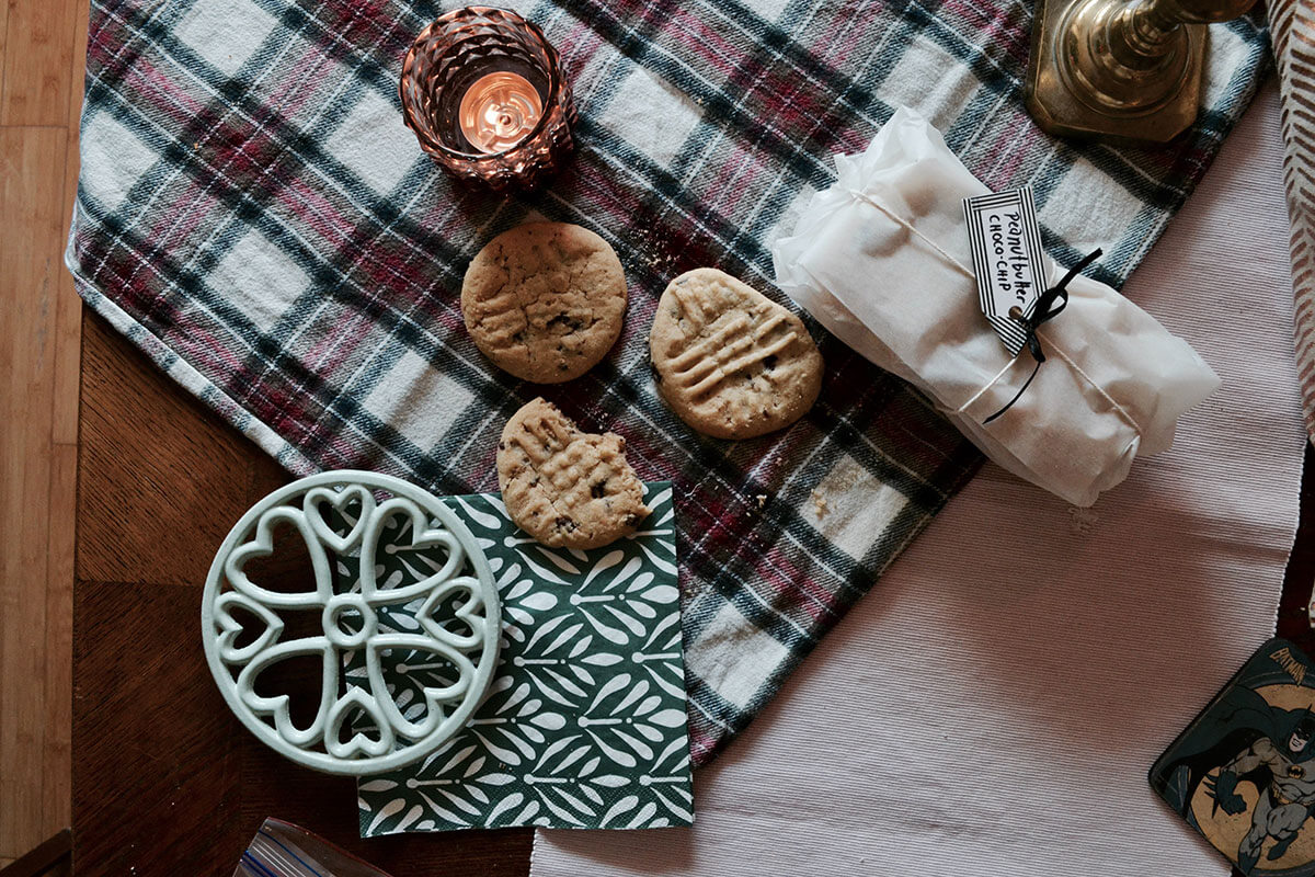 Home baked cookies on a checkered brown and white cloth, the Hygge life