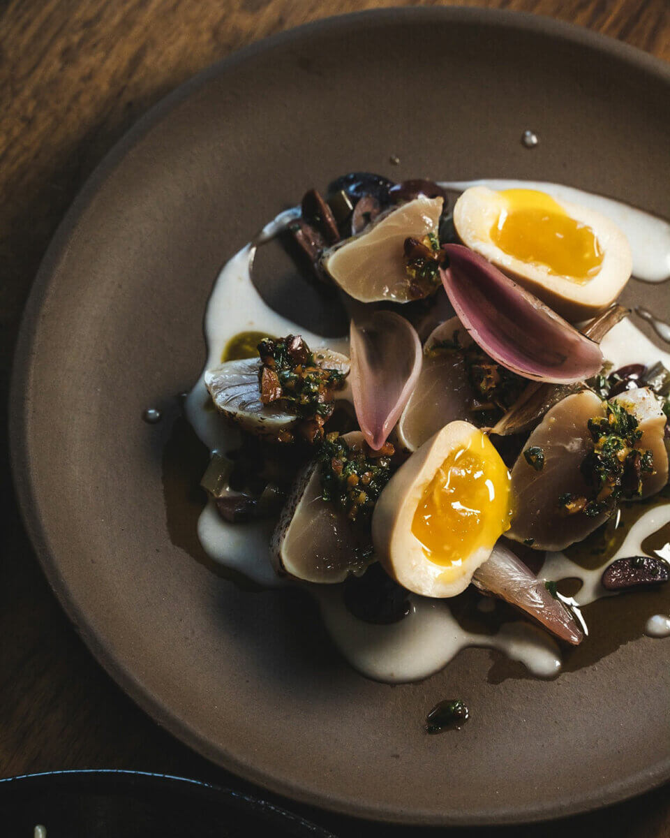 A plate of idgin’s Tuna Tataki Koji Marinated Ramen, an options for fine dining in Gastown, Vancouver