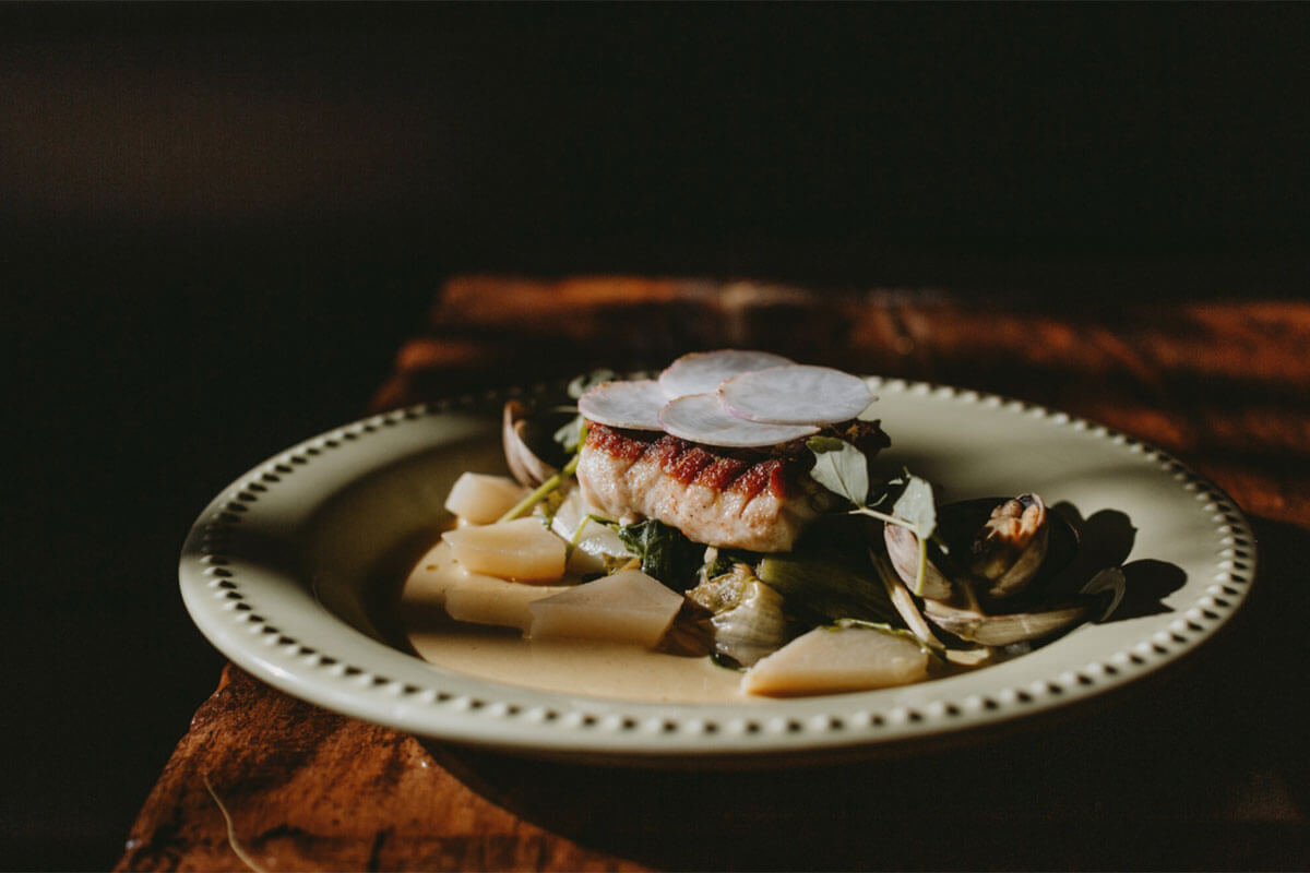 A plated dish at The Mackenzie Room, one option for fine dining in Gastown, Vancouver