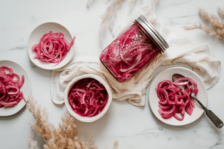 dishes and a jar of quick-pickled onions