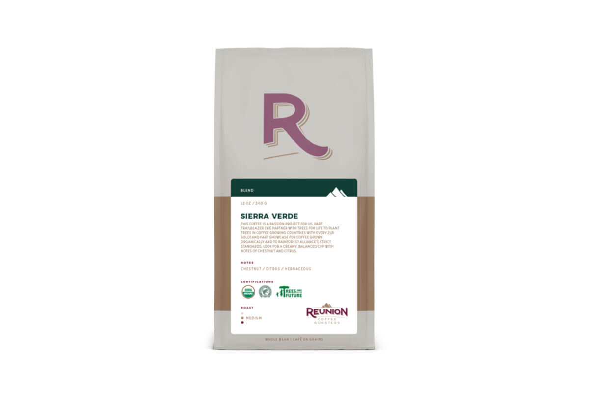 white, green, brown and pink package of Reunion coffee, among the top 5 Toronto coffee roasters