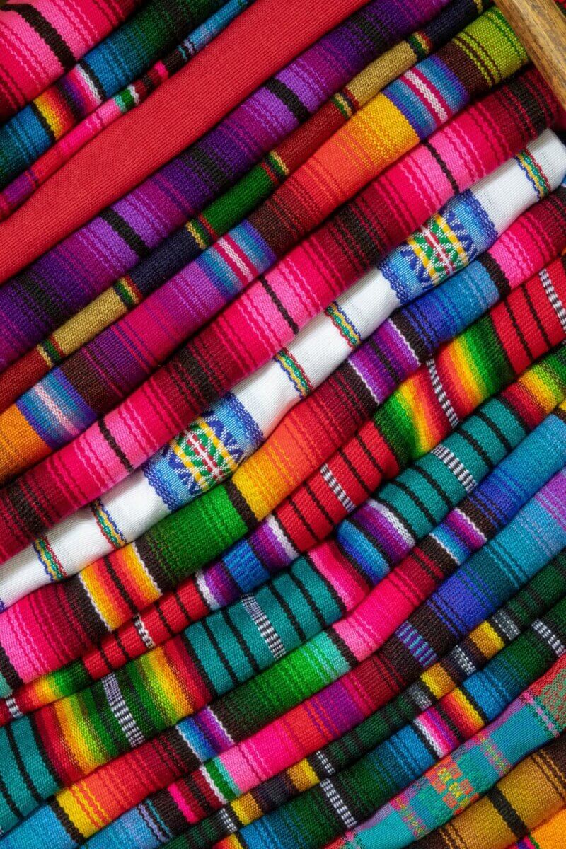 Multi-coloured Mexican blankets can be found in Cancun adventures