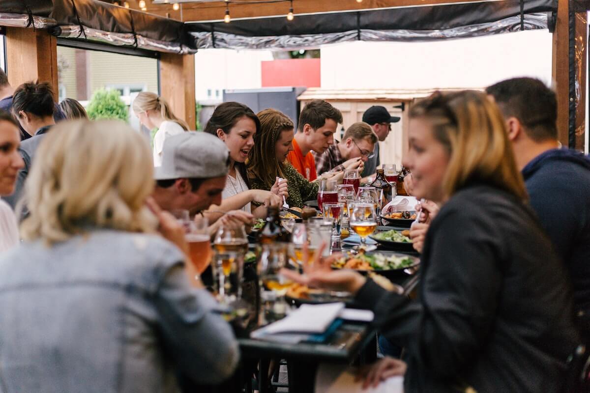 A group of people dining safely in Nova Scotia restaurants