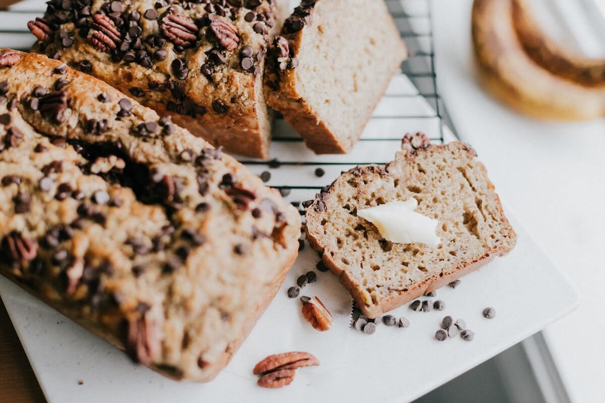 2 loaves of banana bread on a rack