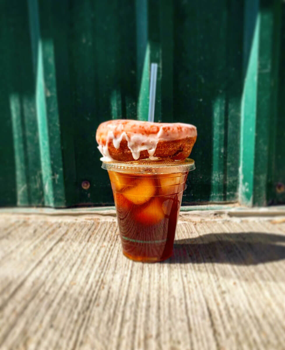 An iced americano and a donut to enjoy april in regina