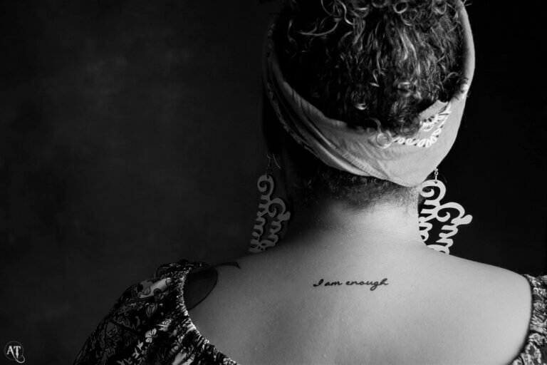 back of woman's neck with tattoo from Conscious Ink