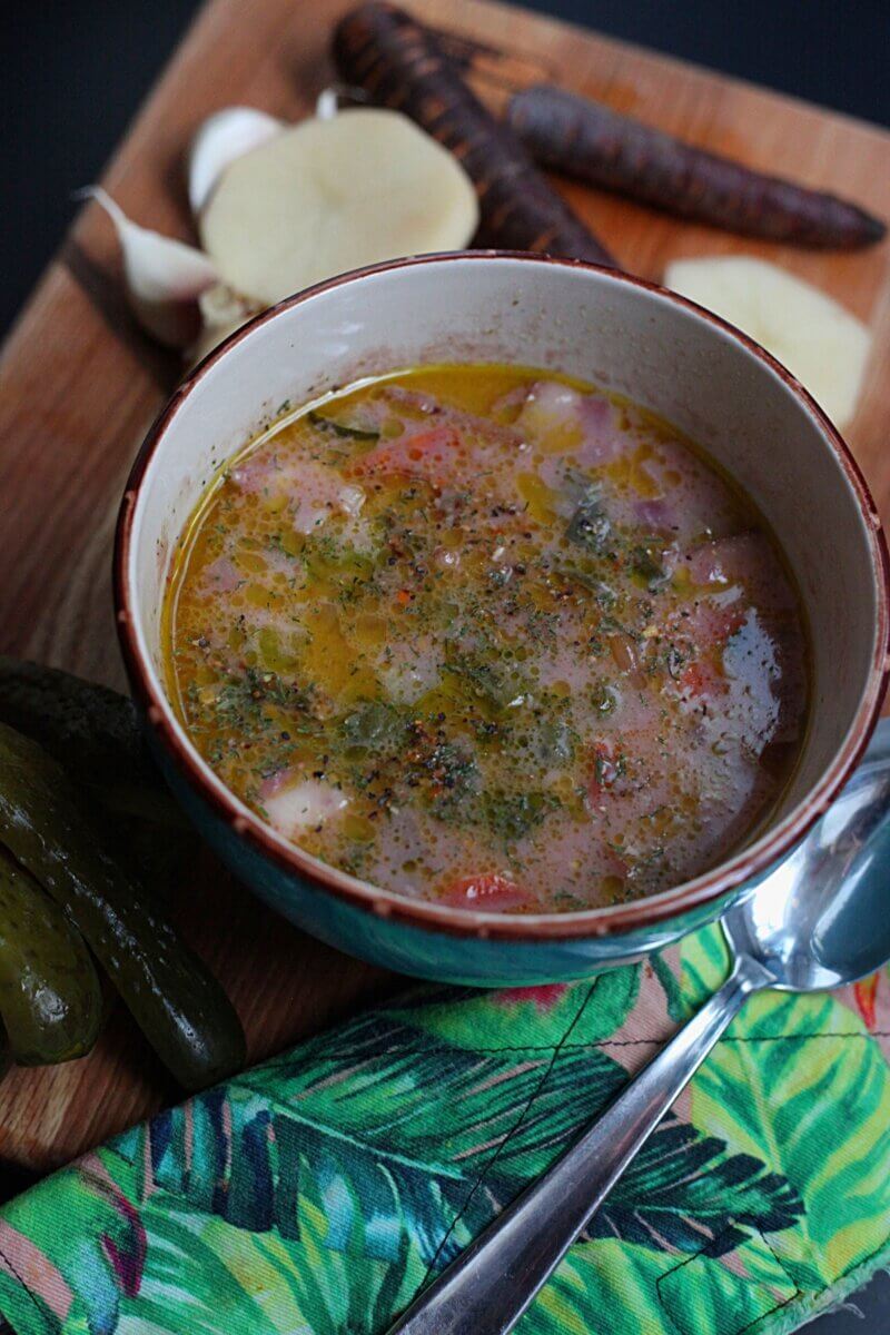 a bowl of delicious dill pickle soup