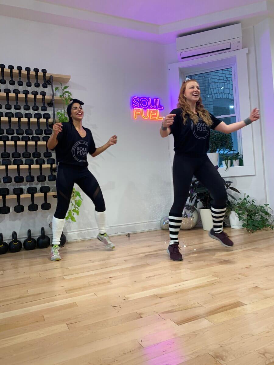 2 women in a free fridays at soul fuel fitness workout session 