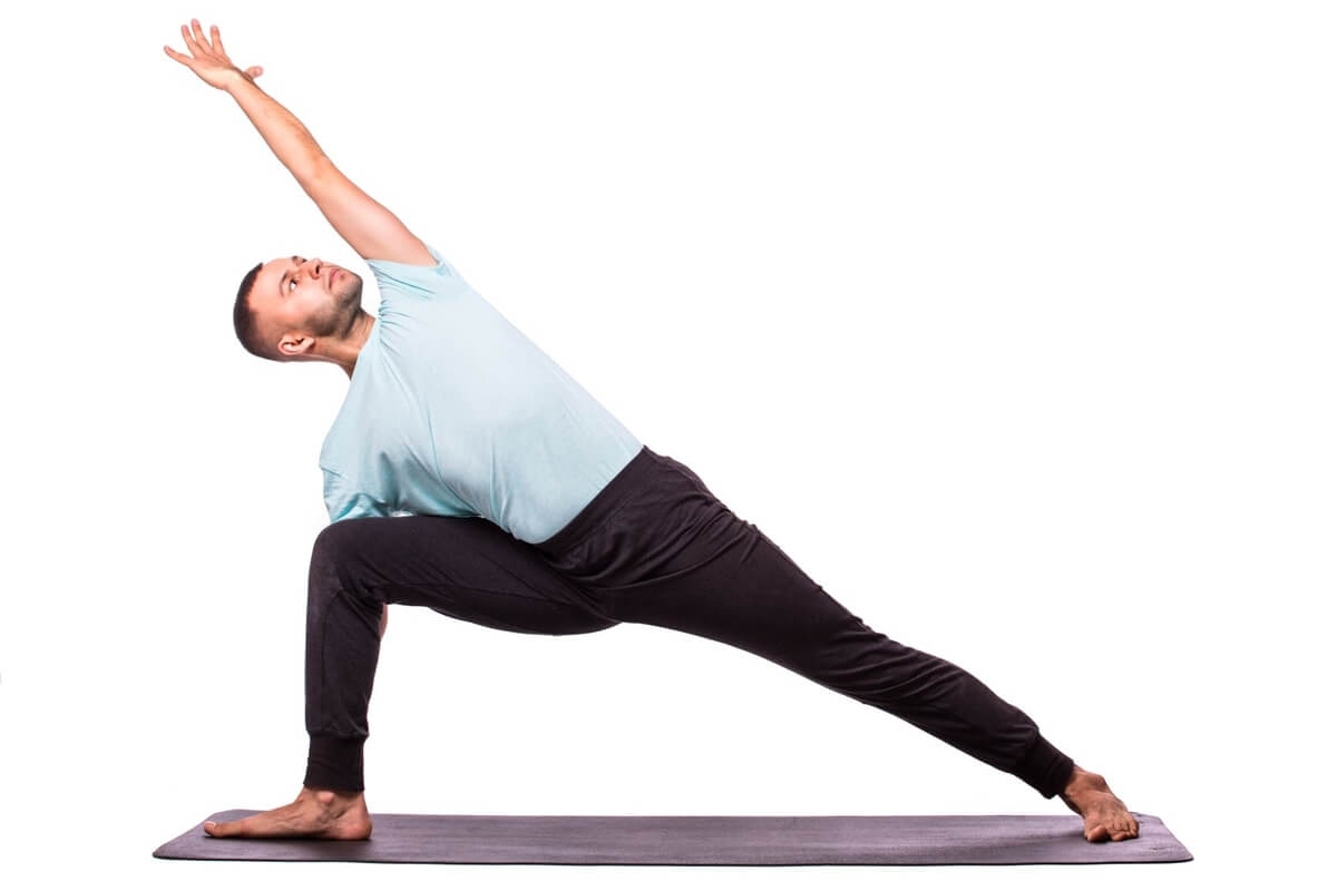 man in yoga stance nurturing health & wellbeing