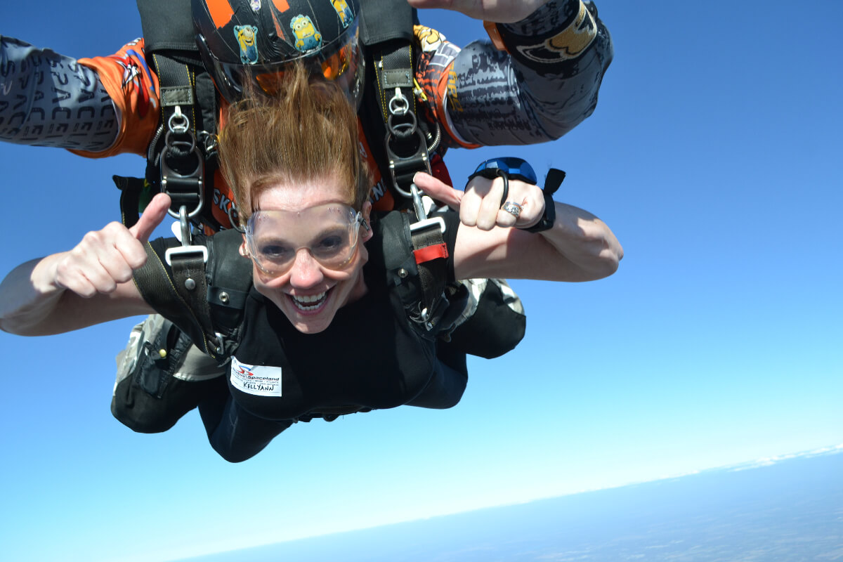 woman skydiving with 2 miles of smiles dallas