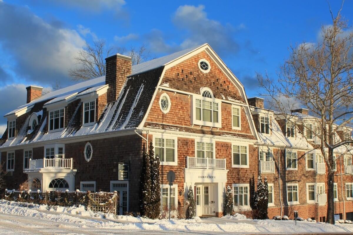 3 story brick building in the winter, Harbour House Hotel is one of Ontario's best weekend getaways