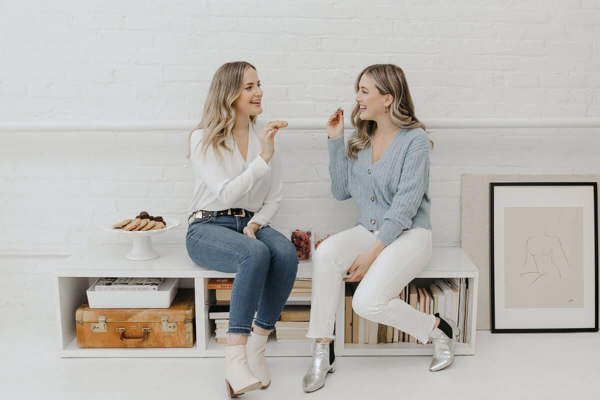 two women on couch showing ally chic mom cannabis