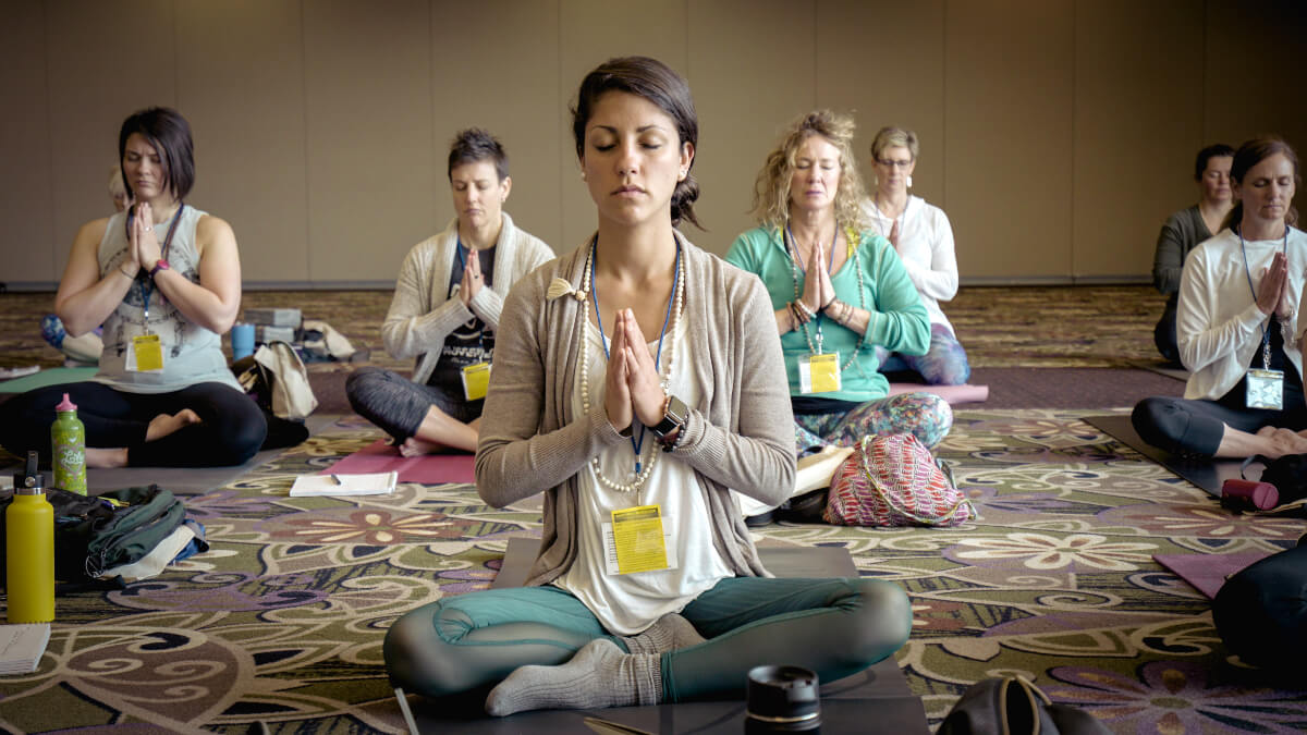 women seated in  meditation practice