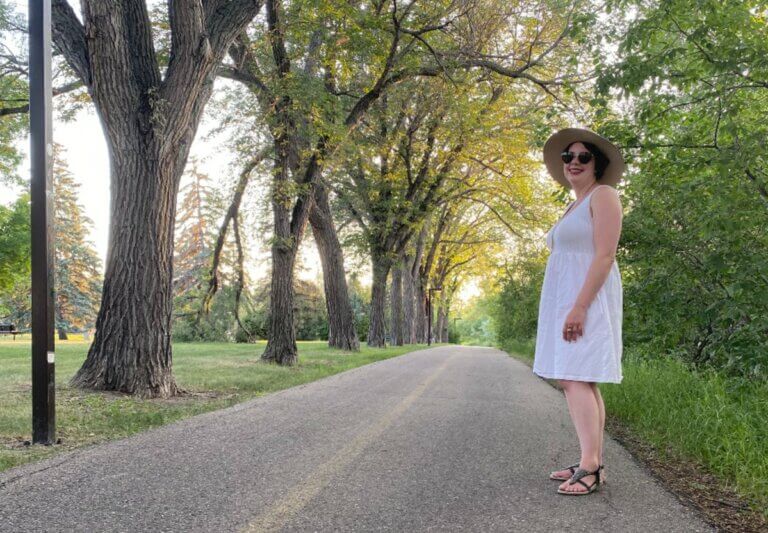 woman standing on one of the many Regina walking paths