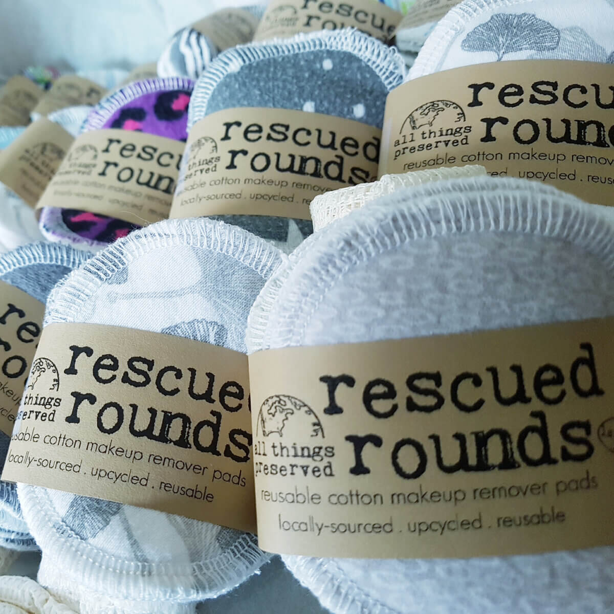 closeup of white cotton rescued rounds for removing makeup, a sustainable product by All Things Preserved