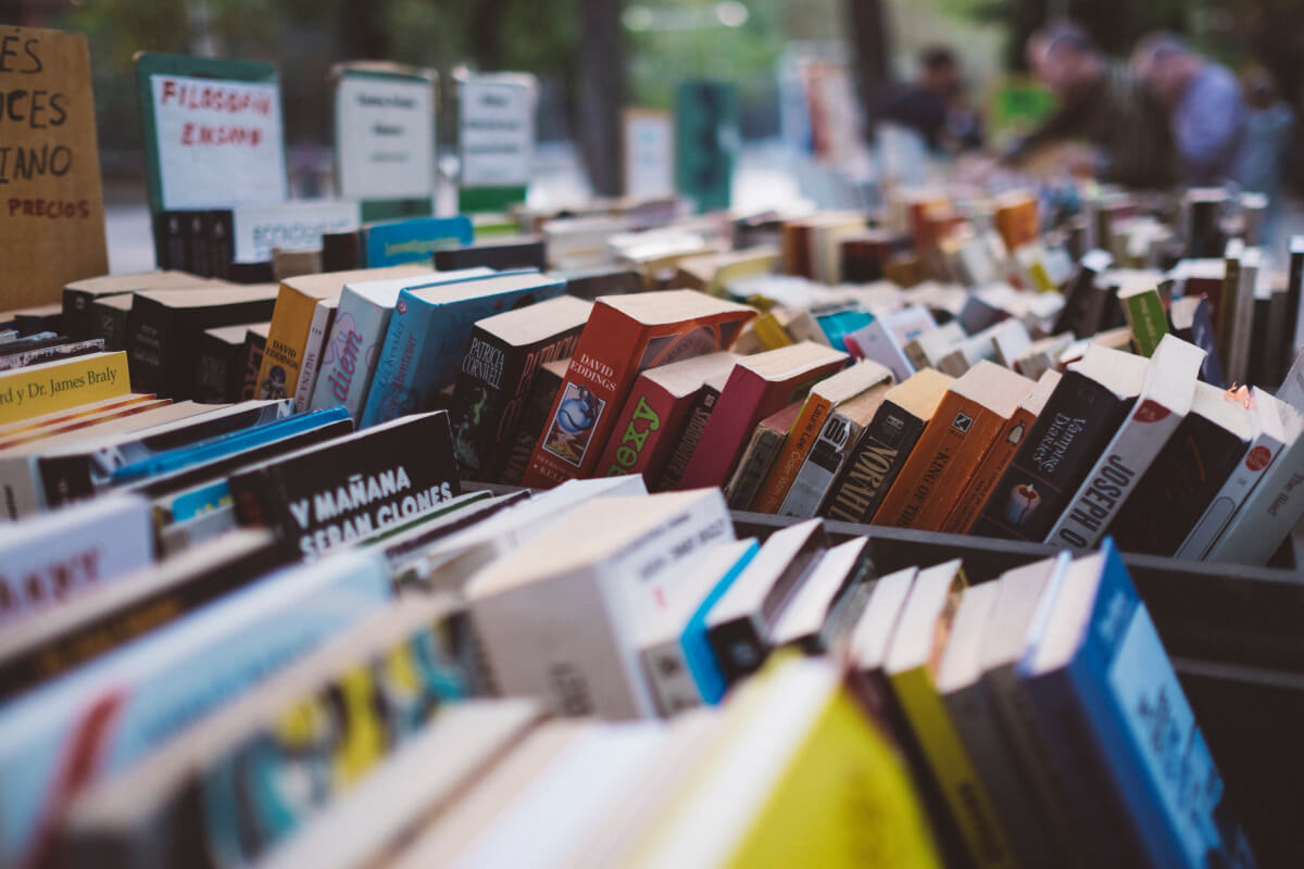 rows of books stacked for the texas book festival