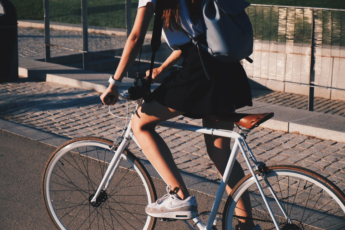 person riding bicycle to help fight climate change