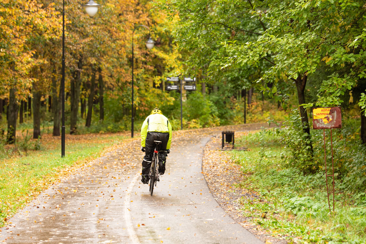 Cyclist riding through the park