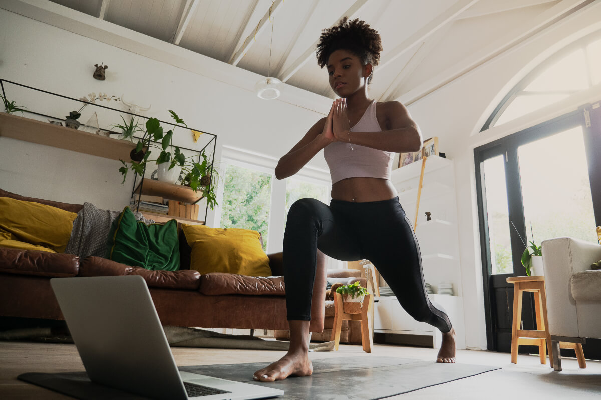 a woman practicing a yoga position