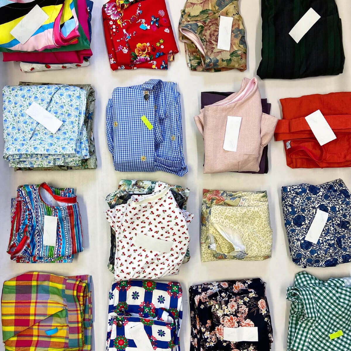 A flatlay of ethical clothing by Emperor’s Old Clothes prior to being wrapped and mailed off to customers. 