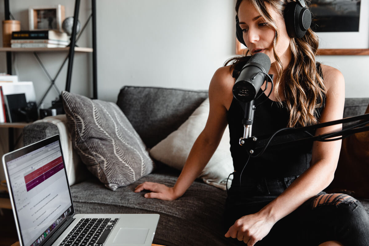 Woman talking into microphone 