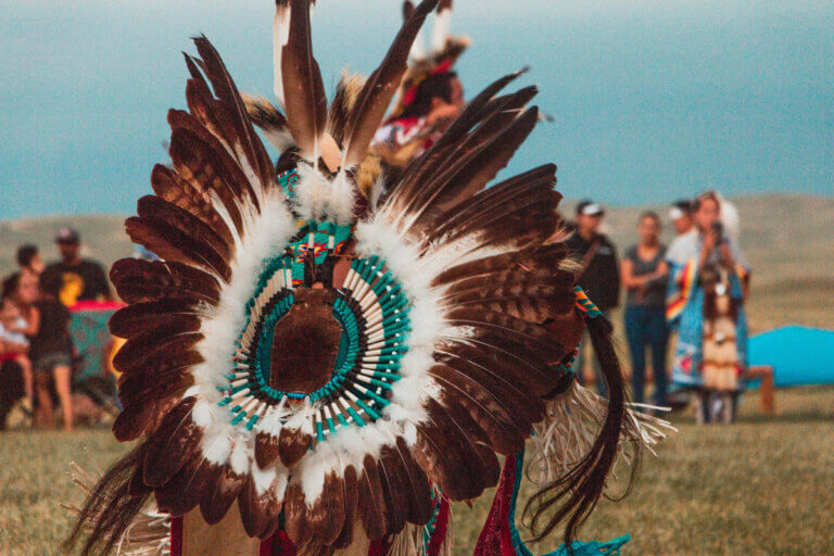 Close-up of regalia worn by a pow wow dancer, an example of Indigenous culture