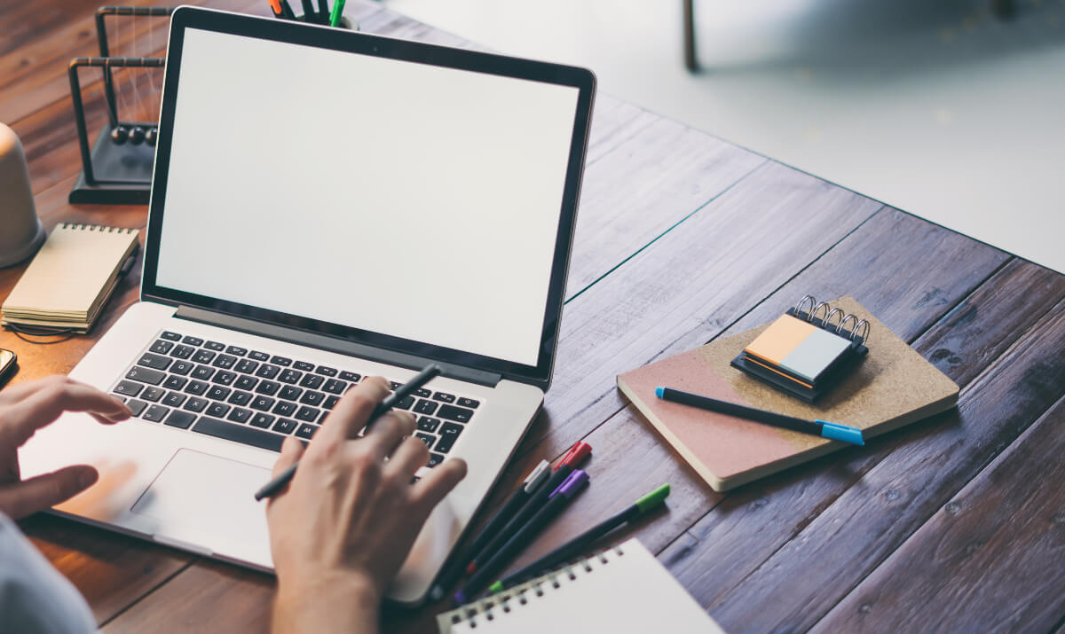 Person working on a laptop using time-saving work apps 