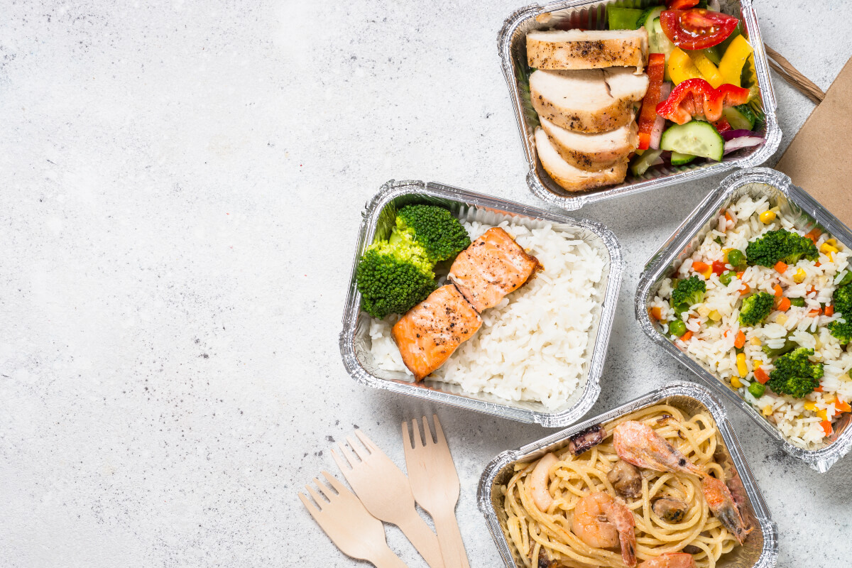 Healthy meals prepped in reusable containers 