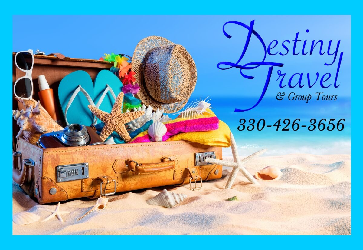 Destiny Travel & Group Tours: 330-426-3656

A suitcase on the beach full of travel supplies. 