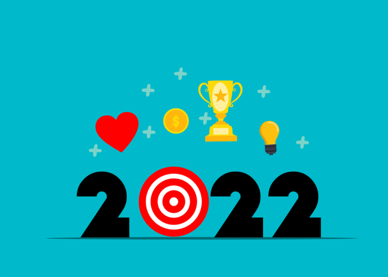 The year 2022 with a trophy, heart, lightbulb, and target around it.