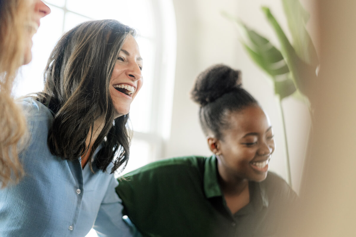 3 females having fun laughing