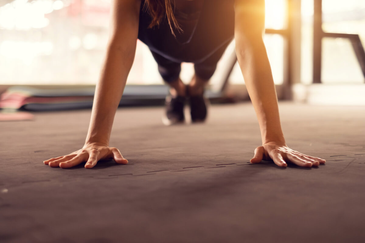 closeup of woman in pushup position