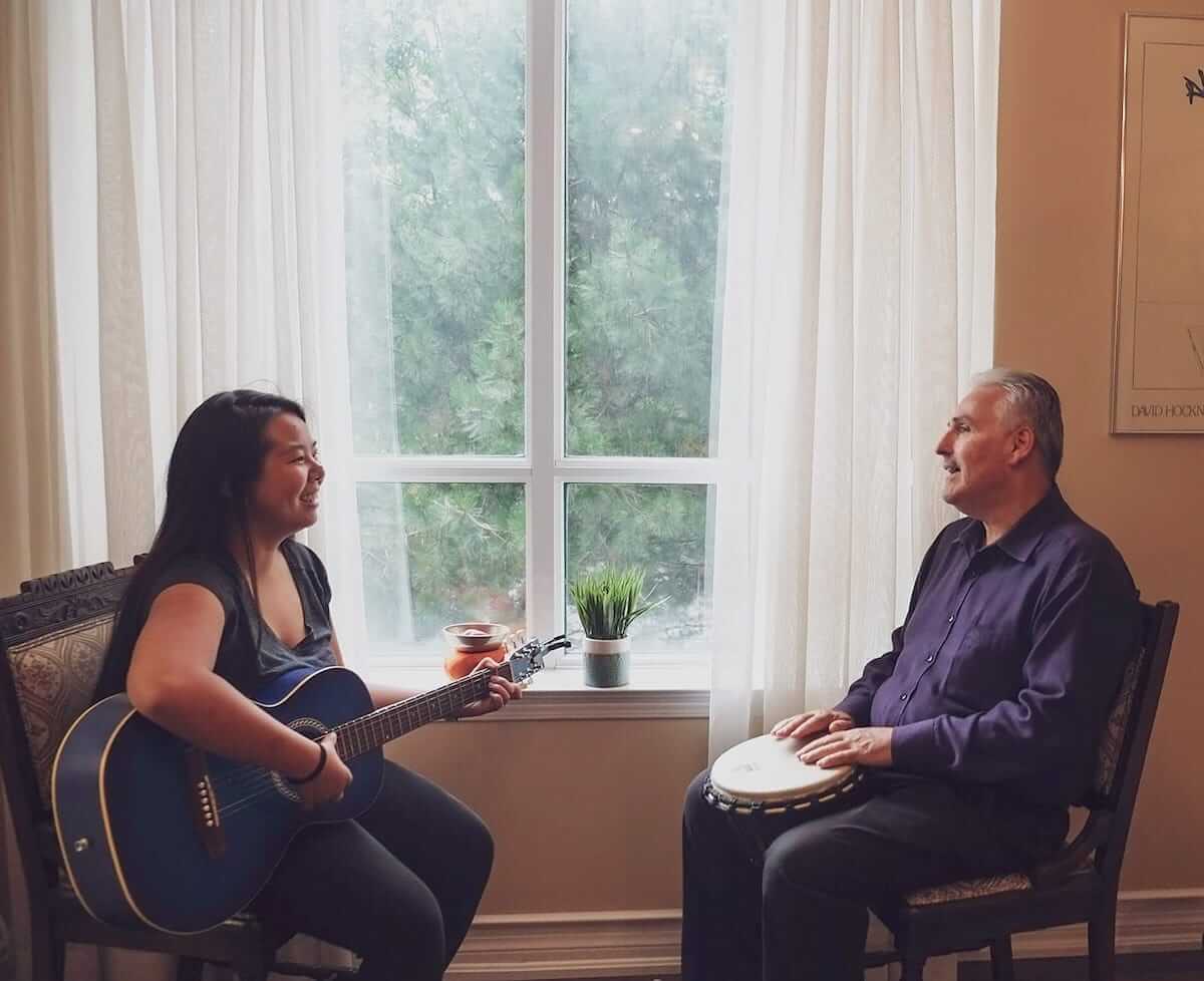 A music therapist from MIYA working with a client. Photo courtesy of Miya Adout.
