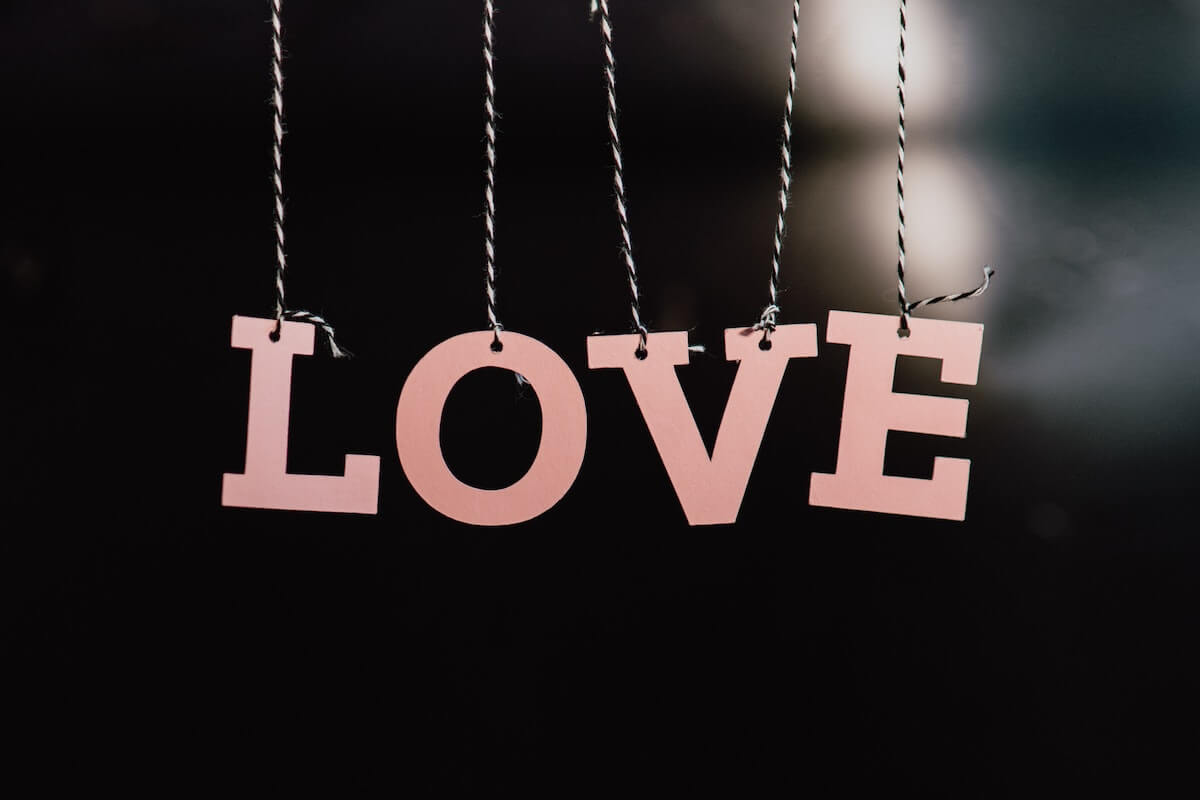 The word 'love' crafted with strings