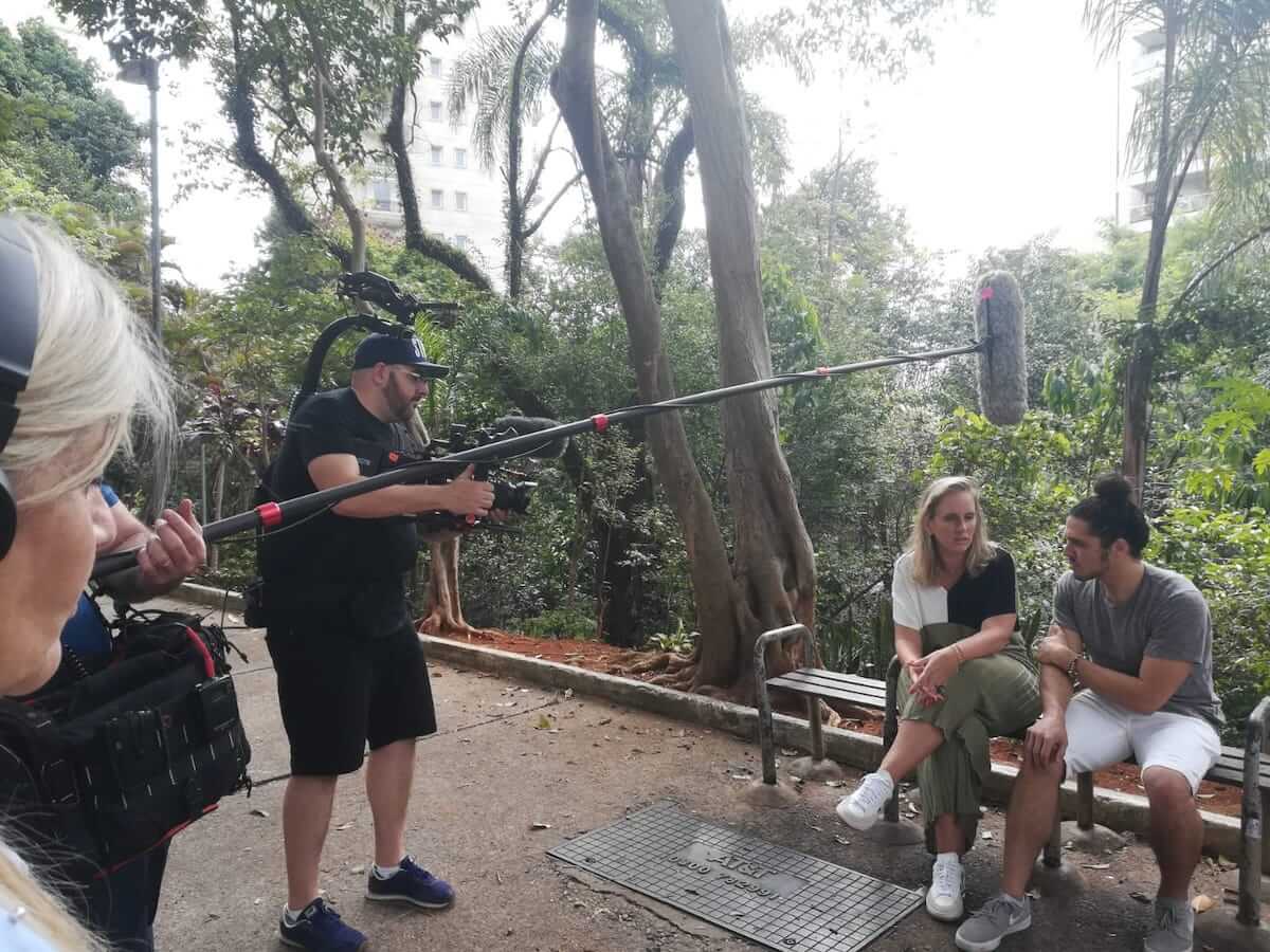 Noemi Weis, far left, is pictured while filming a scene for Connecting the Dots, which interviews experts, educators, young people and their families about youth mental health. 