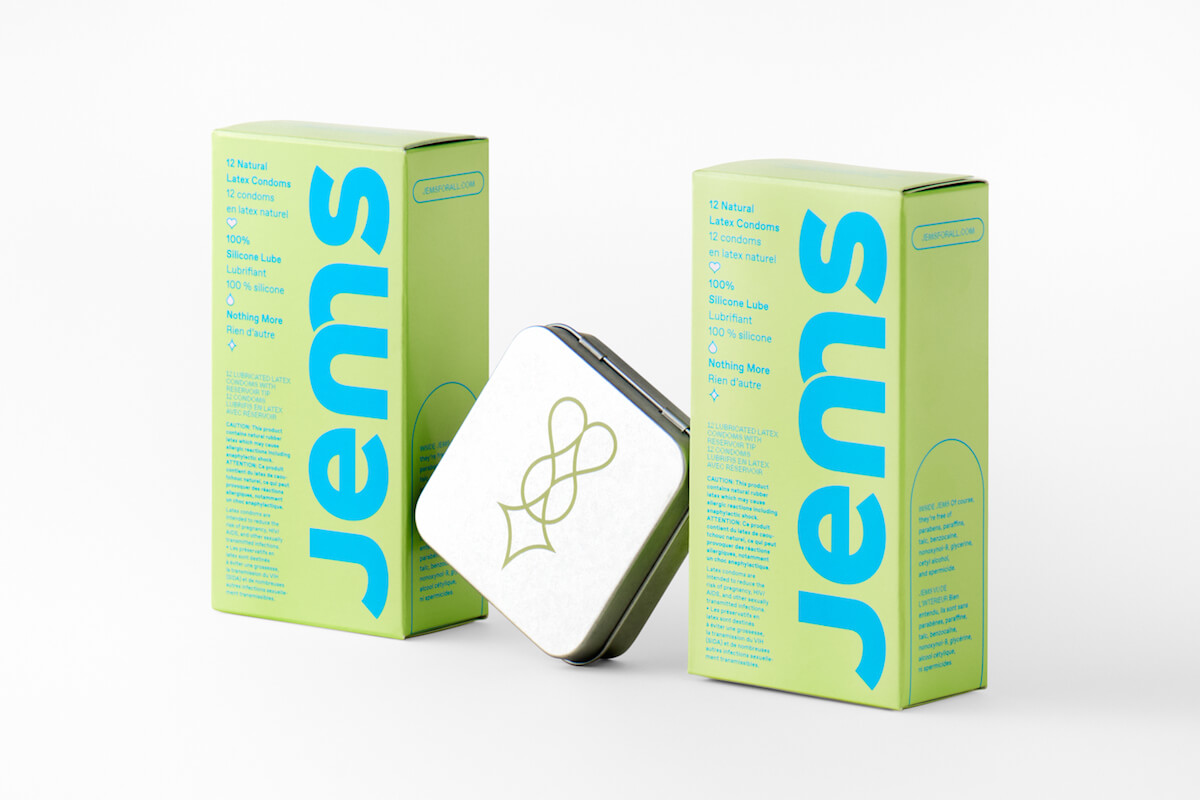 Showcase of Jems natural latex condoms in gender-neutral color packaging.