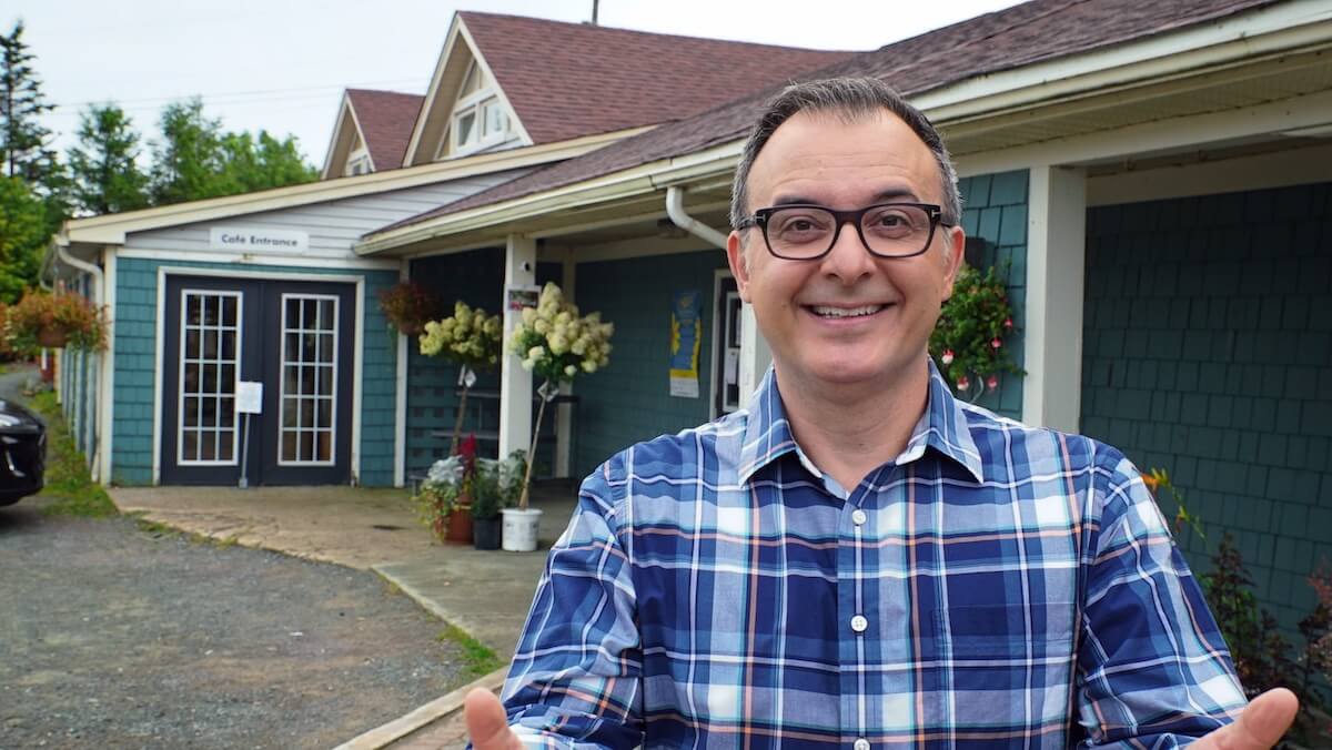 On the third season of Big Food Bucket List, John Catucci stopped in at The Grounds Café, a farm-to-fork eatery in Portugal Cove in Newfoundland — one of Catucci’s favorites for its rugged natural beauty and the hospitality he was shown by locals. Photo courtesy of Food Network Canada.  
