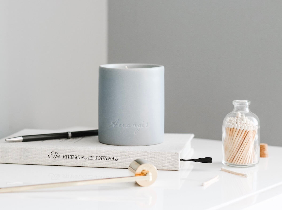 Sustainable fragrance brand Aerangis tries to make their ceramic jars as reusable as possible, with a subtle logo and a label that easily peels off. 
