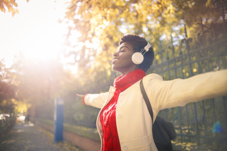 Girl enjoying her time out, while listening music