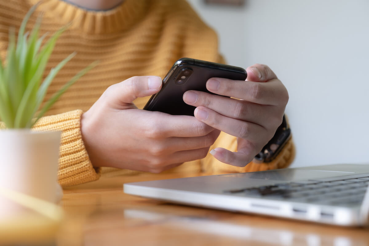 Young asian woman disconnect social and turn off her smartphone.