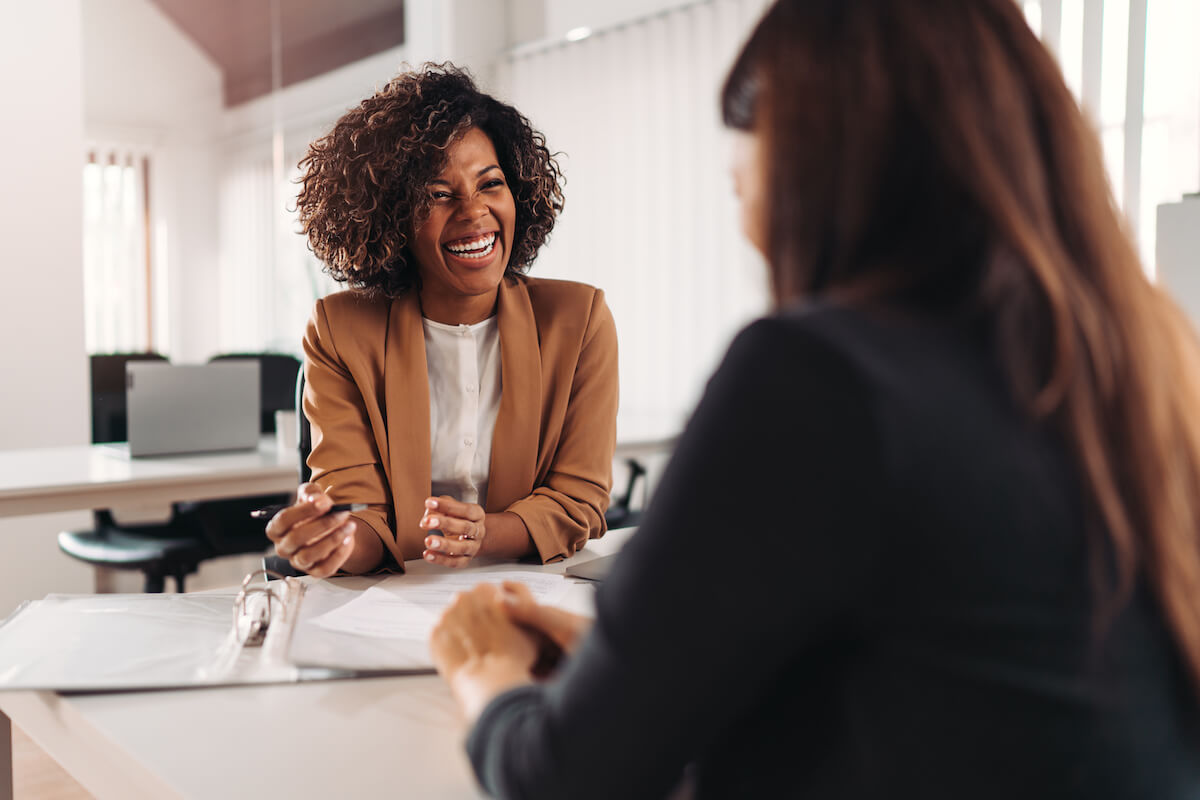 Female financial advisor consulting a client at the meeting