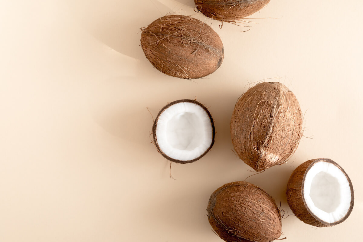 Coconuts on beige background