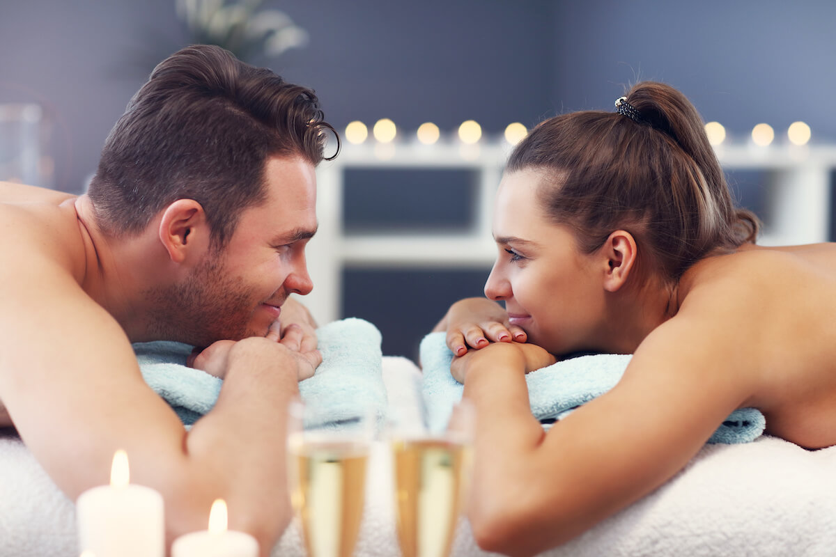Picture of adult happy couple relaxing in spa salon