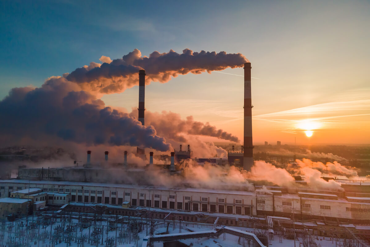 Industrial factory pollution, smokestack exhaust gases. Industry zone, thick smoke.